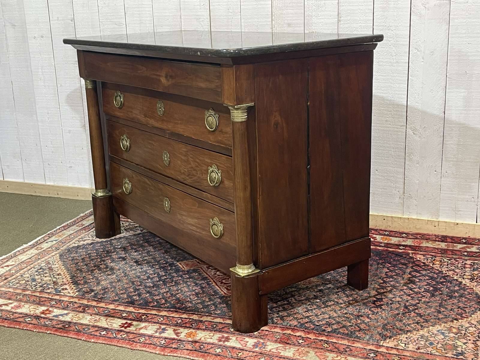 19th century Empire chest of drawers in cherry wood and black marble