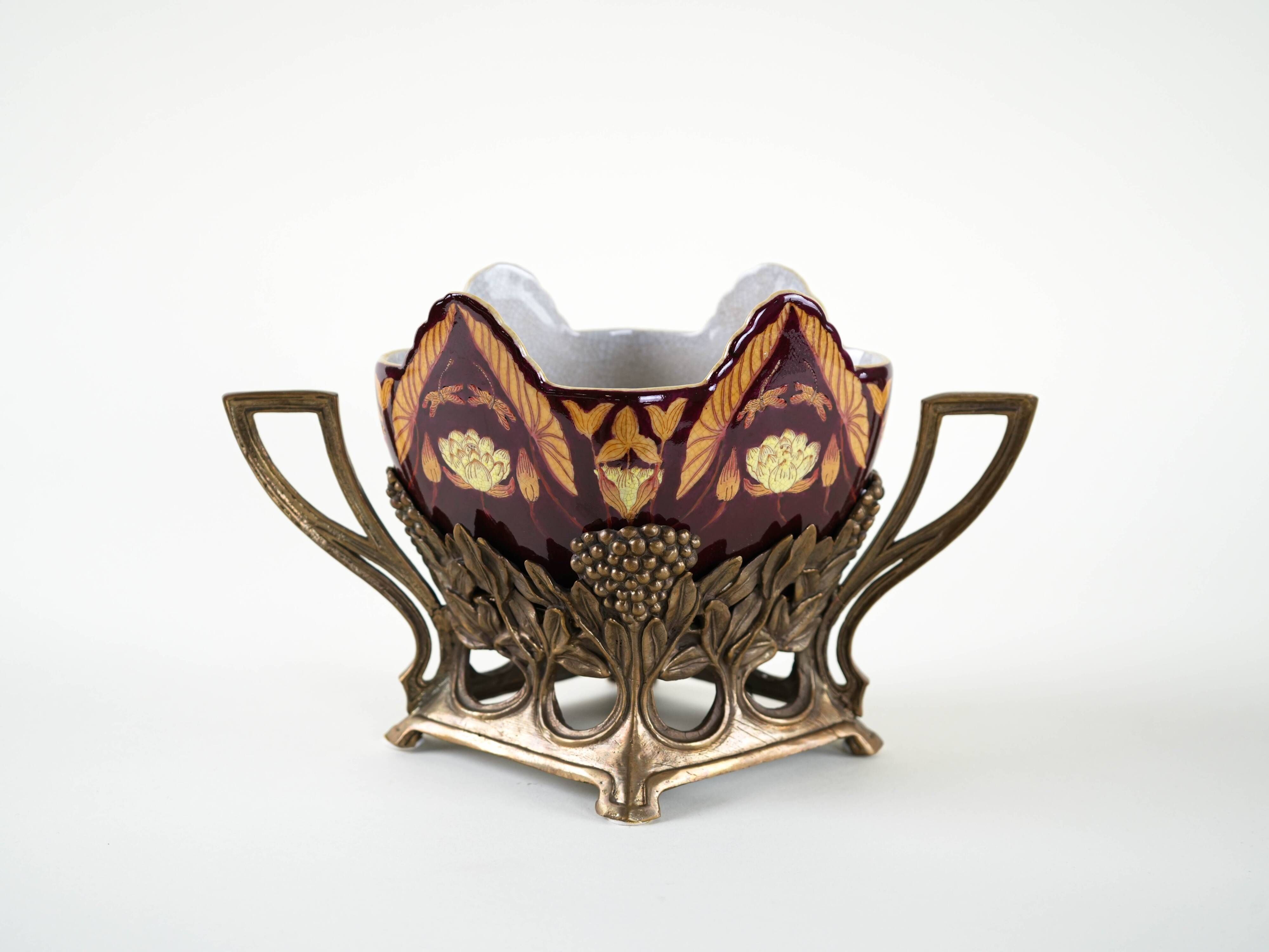 Art Nouveau ceramic platter in gilded basket with grapevine motif, Europe