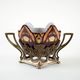 Art Nouveau ceramic platter in gilded basket with grapevine motif, Europe