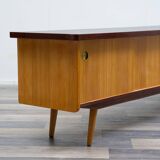 1950s low sideboard in ash, black formica surface. Professionally restored