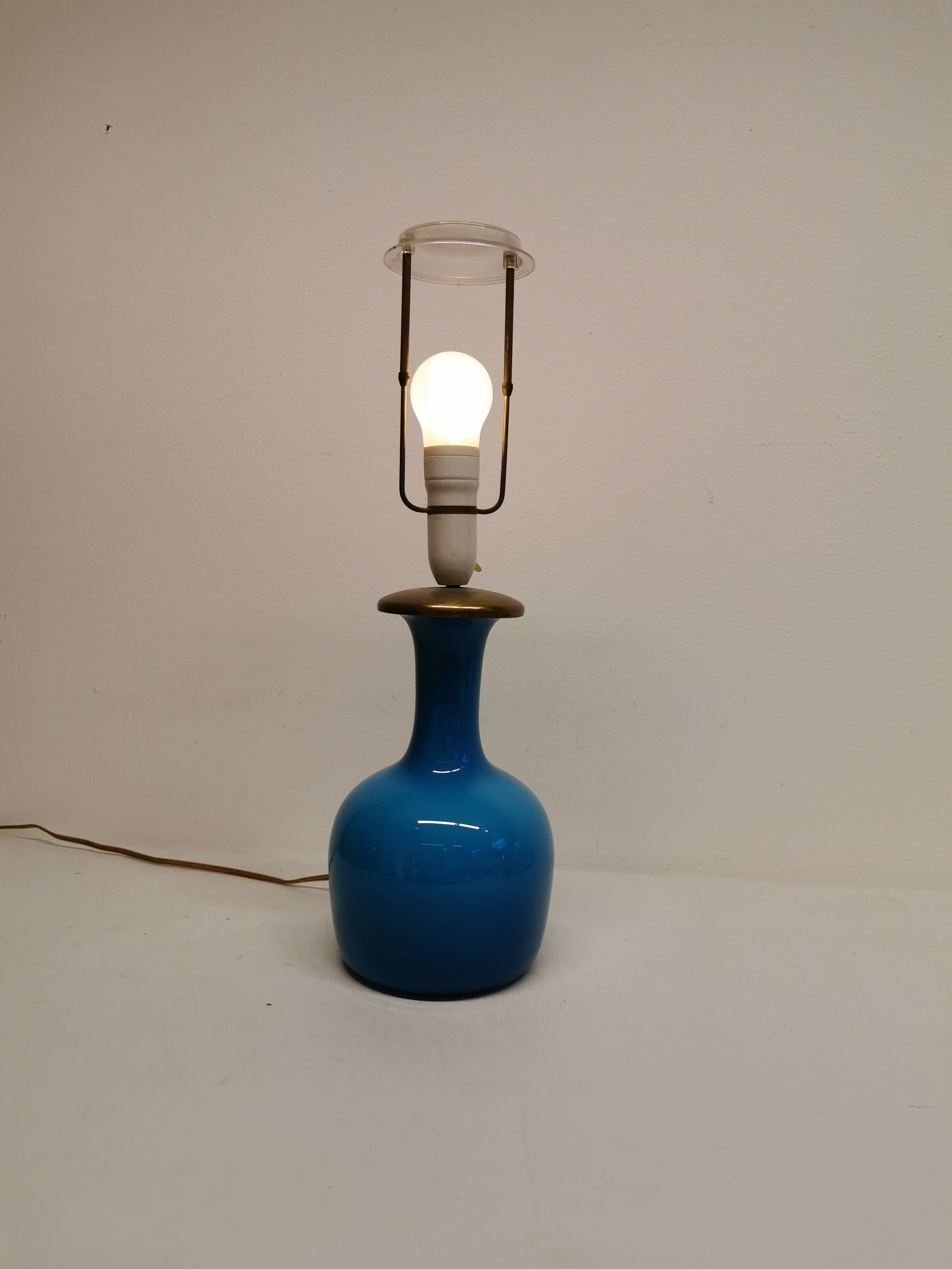 Sea blue glass lamp with brass top