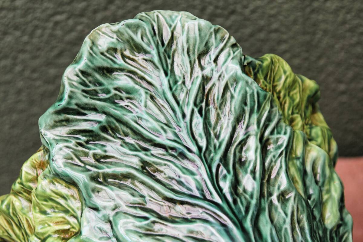 Pair of slip pot covers, cabbage leaves