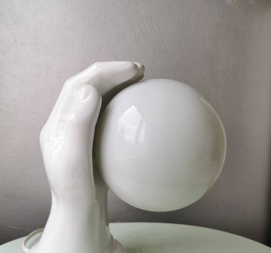 Hand-shaped ceramic wall lamp with 80s glass sphere