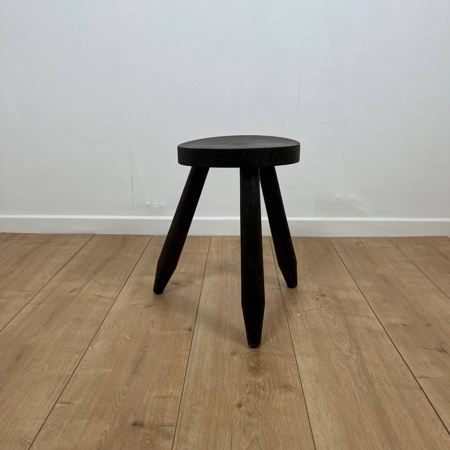 Small brutalist tripod stool in solid wood, 1960