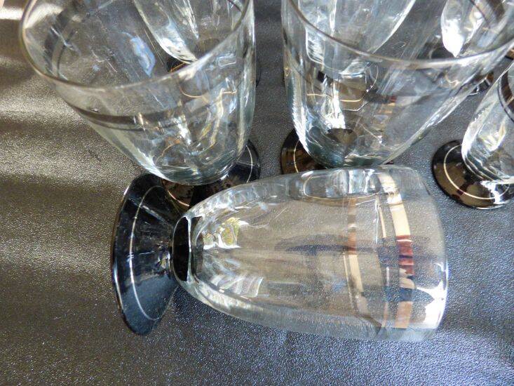 2 series of vintage glasses with black stems from the 1930s.
