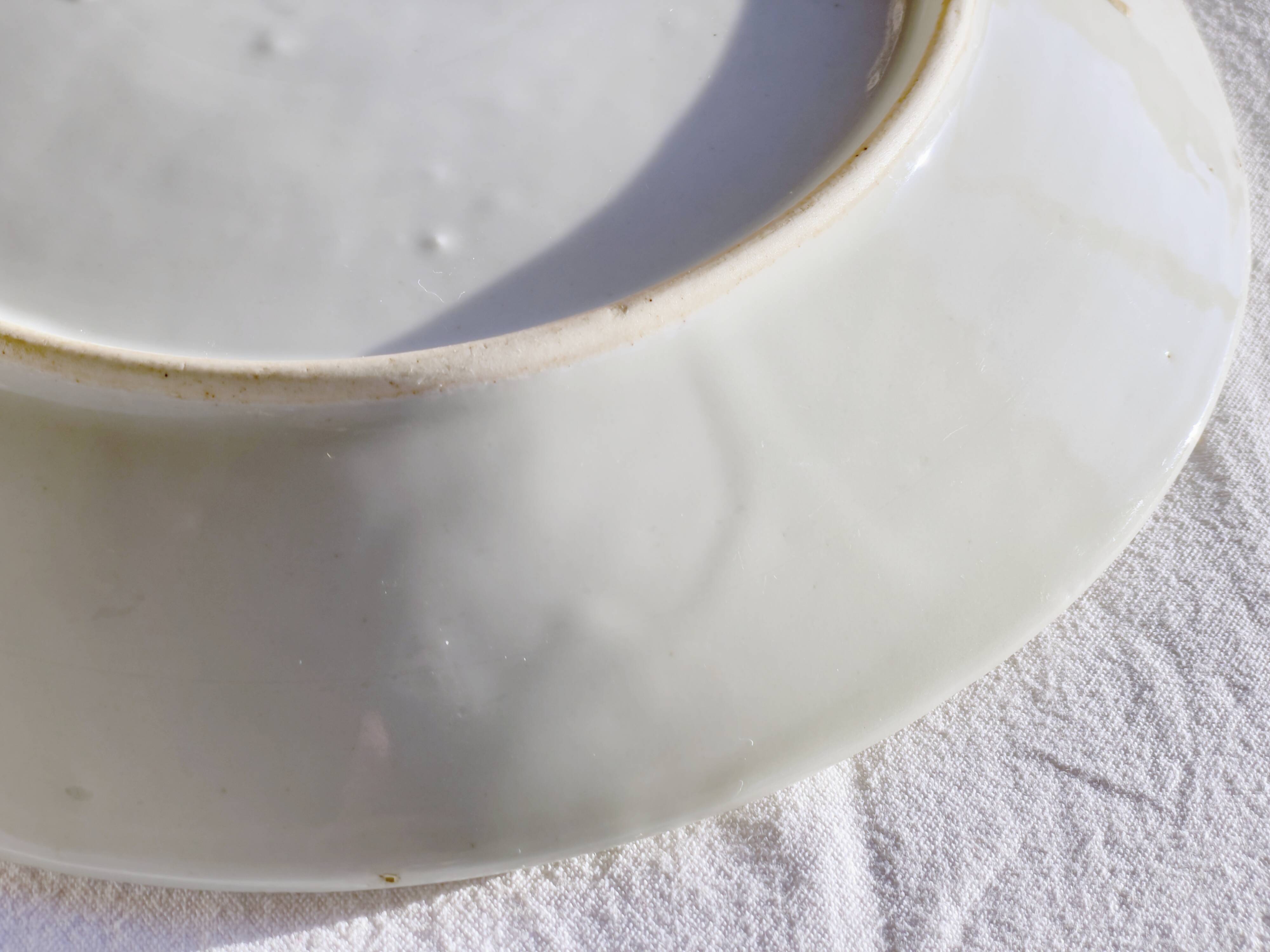 Yellow porcelain plate with saturated and vivid colors. Handmade in Japan