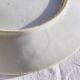 Yellow porcelain plate with saturated and vivid colors. Handmade in Japan