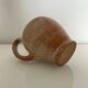 Patinated stoneware jug