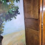 Armoire style Louis XV en merisier sculpté