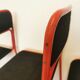 Lot de 4 chaises empilables en métal rouge et noir des années 1970 : Chaise de salle à manger Space Age