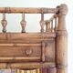 Library, old wooden cabinet imitating bamboo painted in pink