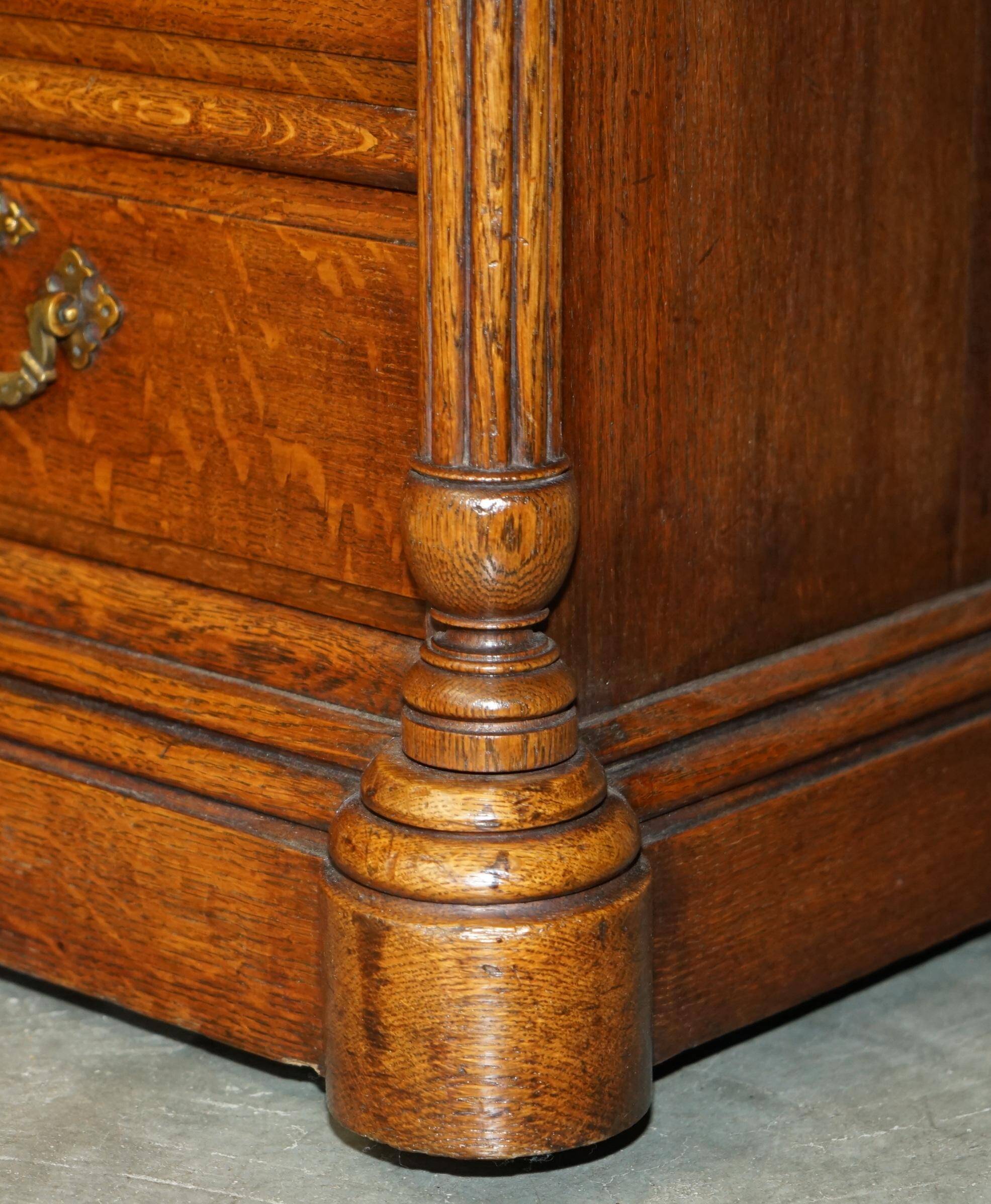 Antique double-sided desk C Hindley & Son in oak and leather