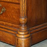Antique double-sided desk C Hindley & Son in oak and leather