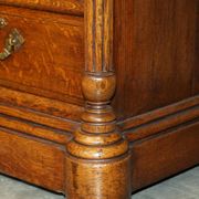Antique double-sided desk C Hindley & Son in oak and leather