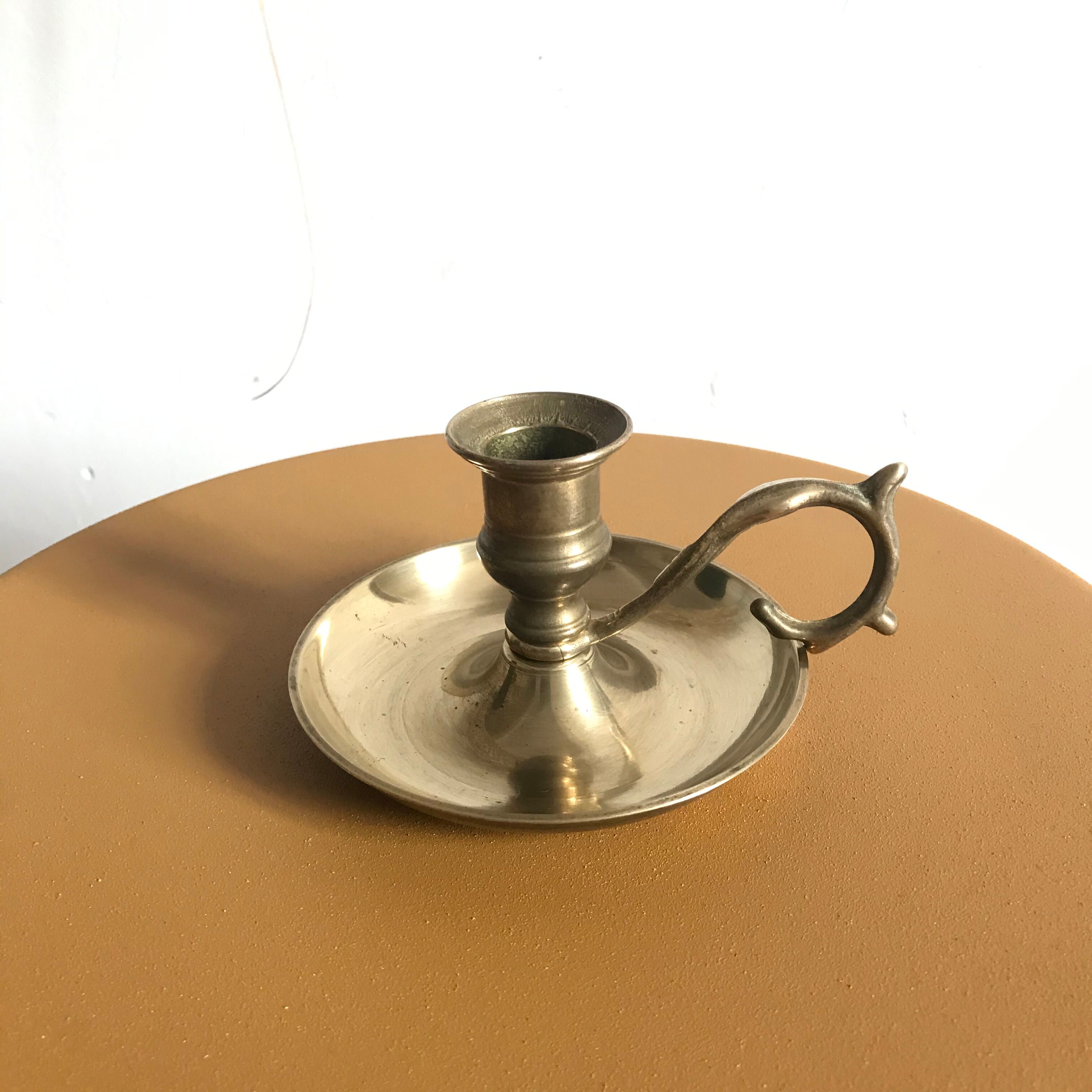 Brass hand-held candlestick