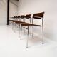 Set of 6 stackable chairs in rust colour by Gijs van der Sluis, 1970s.