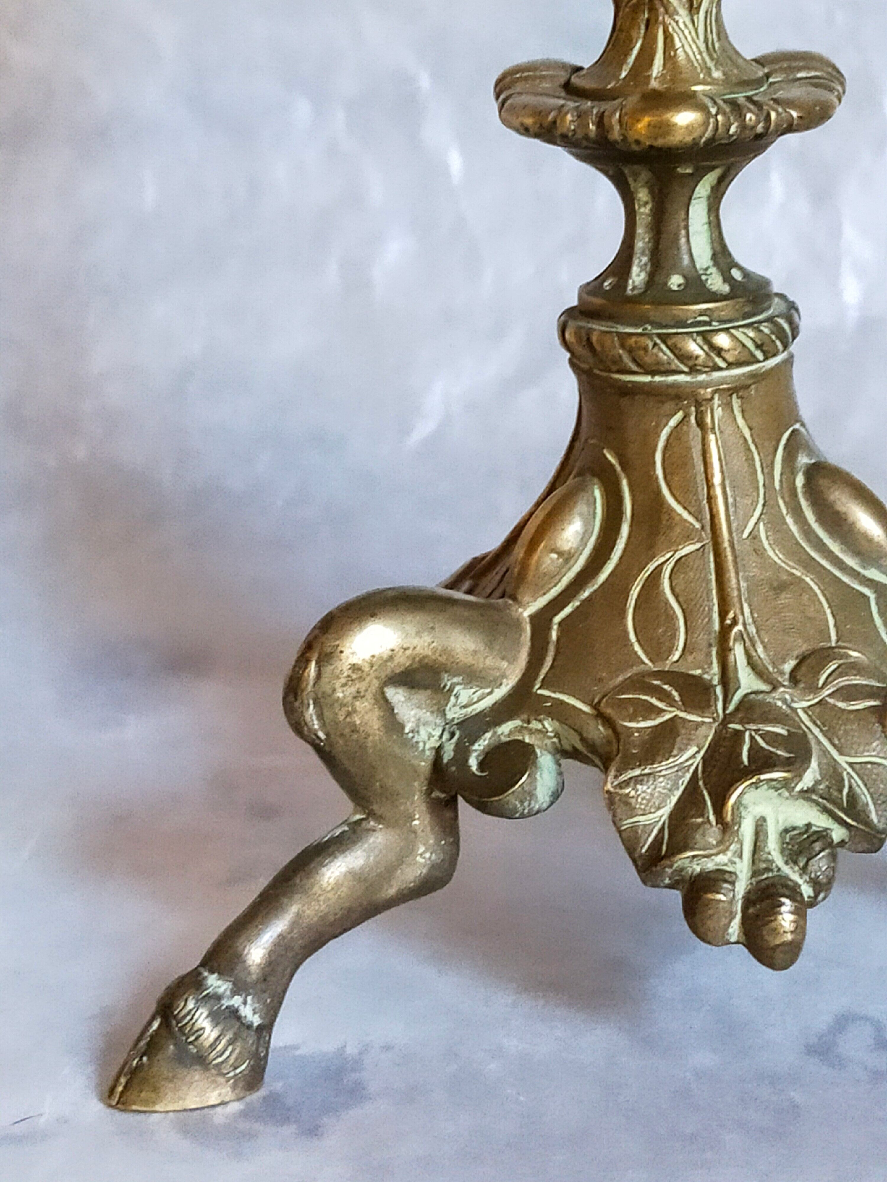 Candle holder in gilded bronze tripod nineteenth century