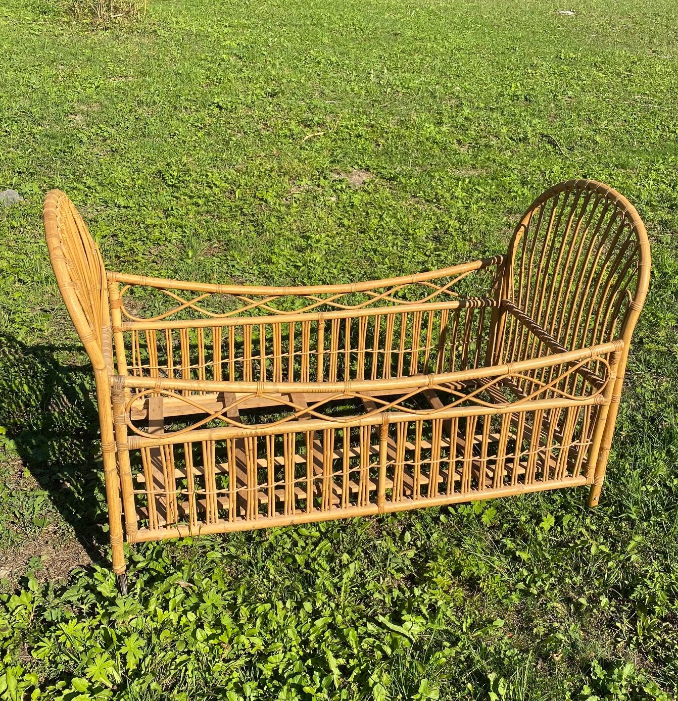 Children's bed in vintage rattan