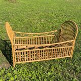 Children's bed in vintage rattan