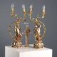 Pair of antique candelabra in carved and gilded wood, Italy, 20th century