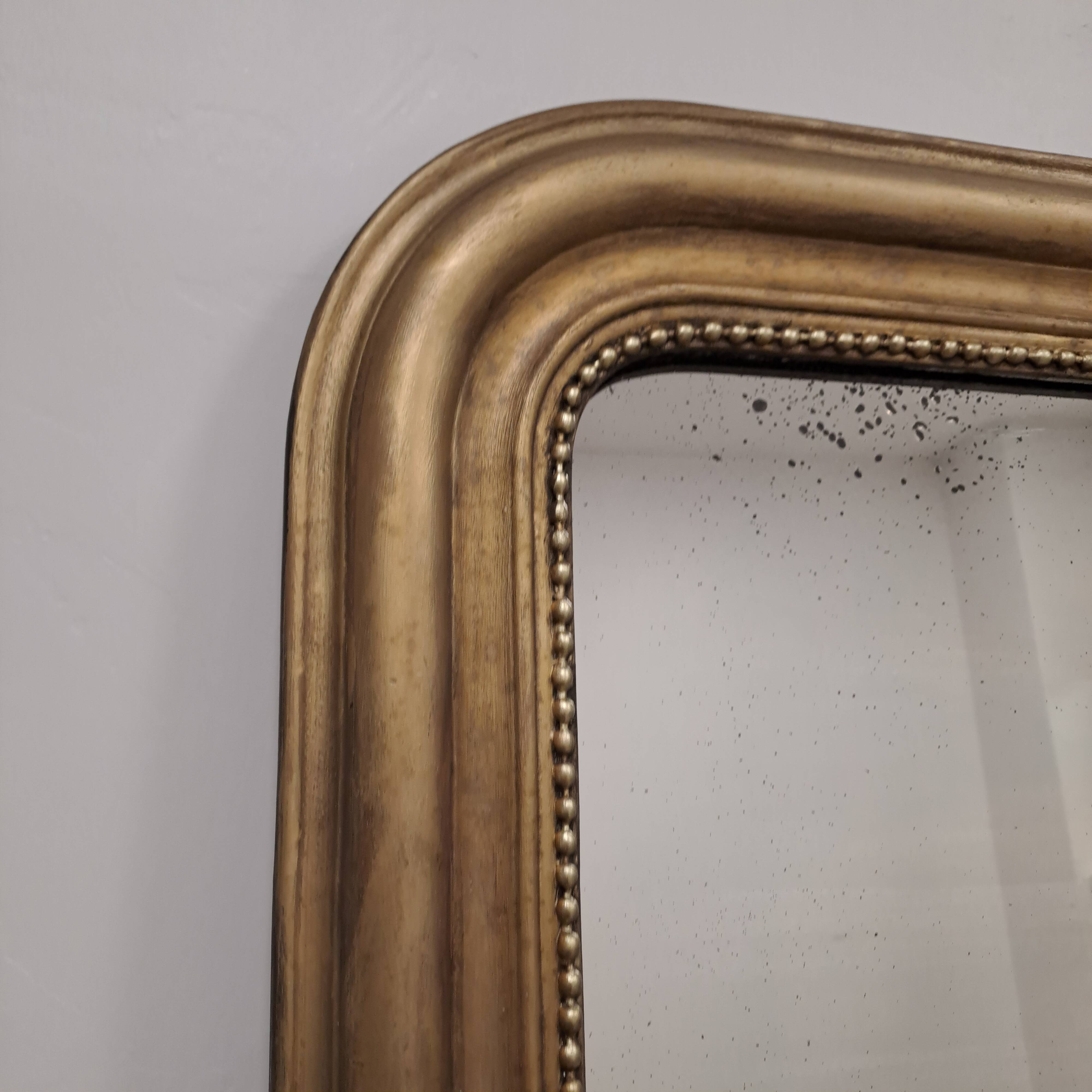 Large antique Louis Philippe gilded mirror