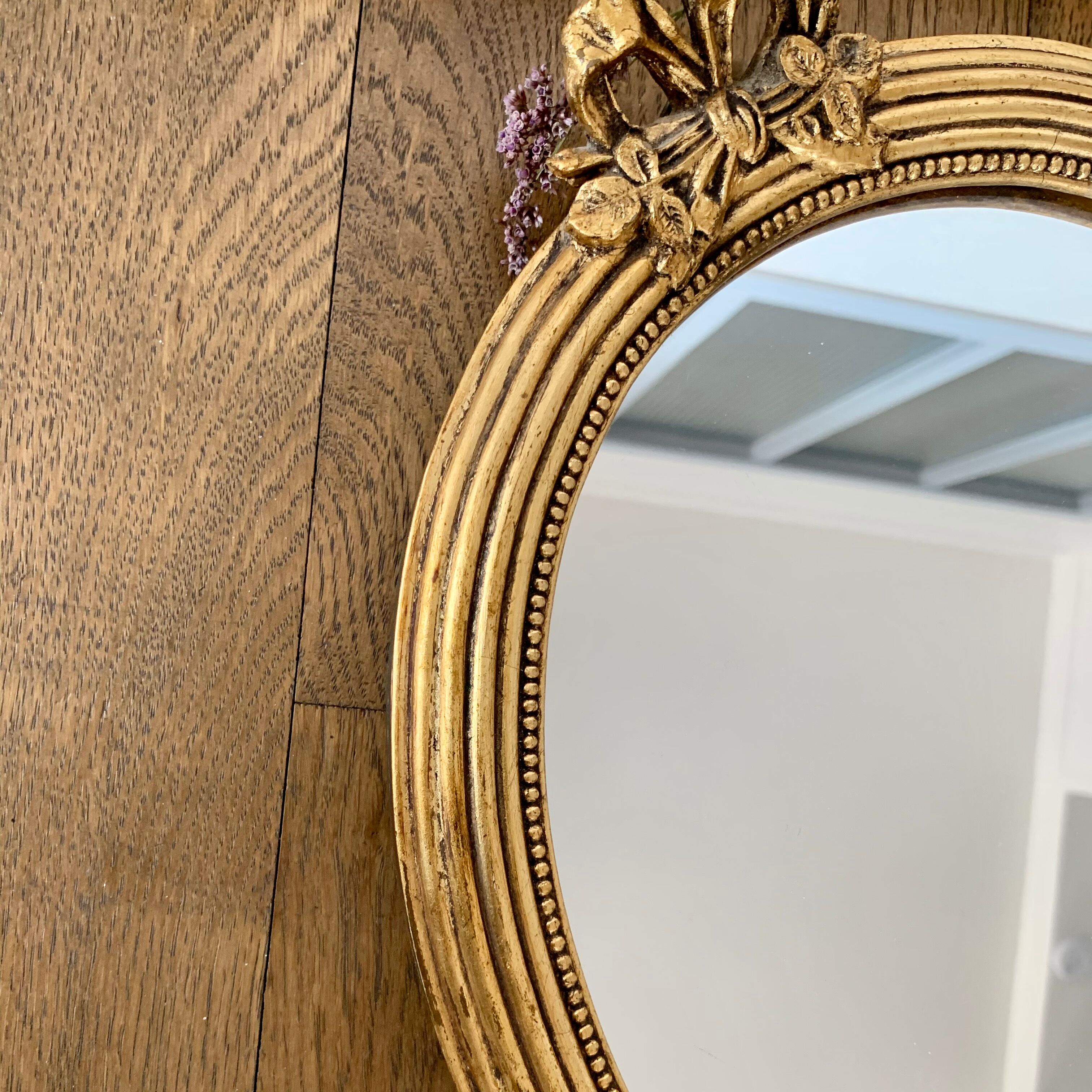 Oval gold mirror 37x27cm