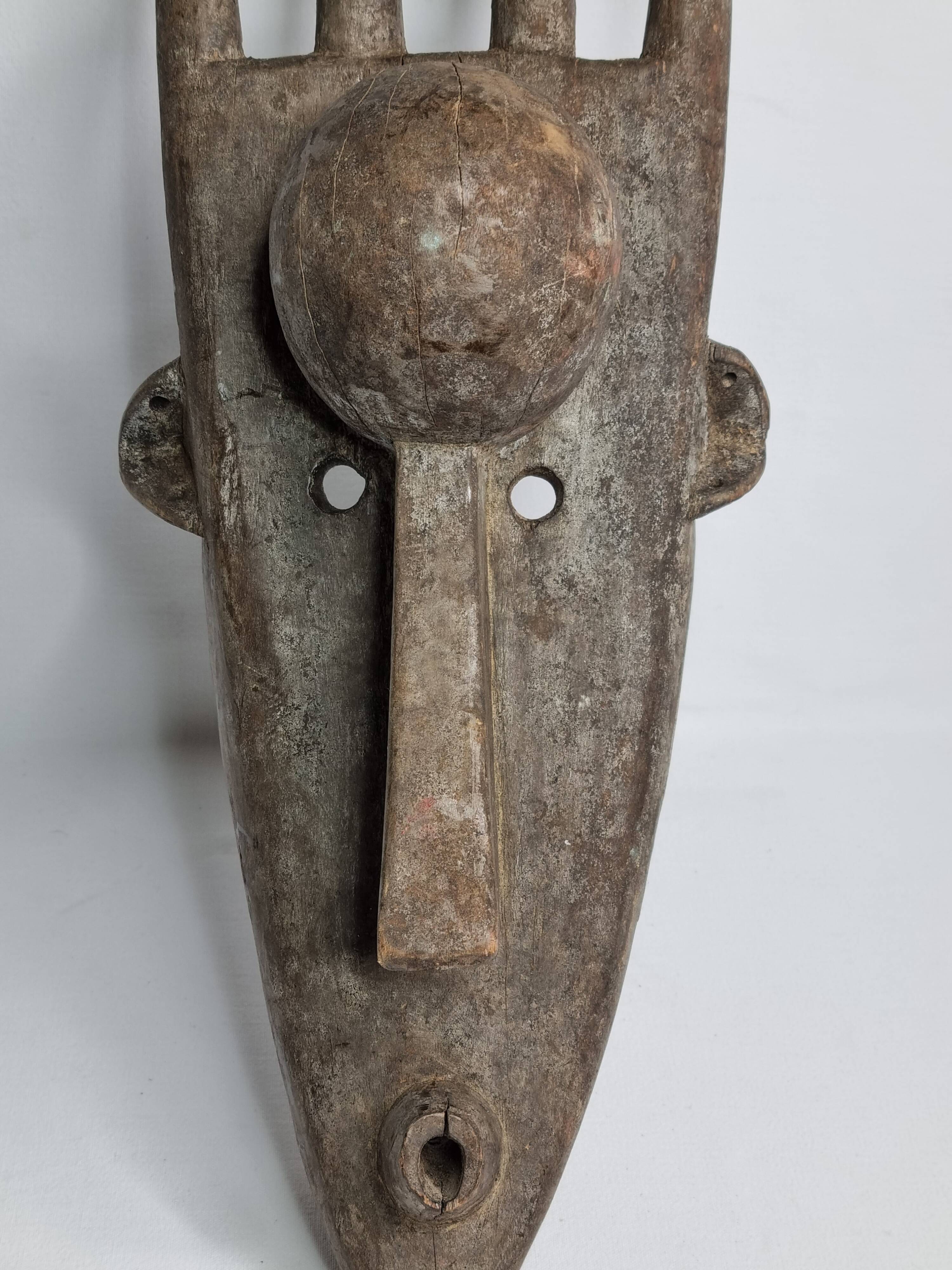 N'Tomo Bambara Mask, Mali, Carved Wood, Antique Patina, 20th Century, 64 cm