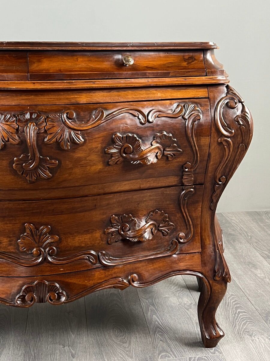 Curved commode in the Louis XV style, carved wood, 19th century.