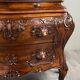 Curved commode in the Louis XV style, carved wood, 19th century.