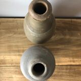 2 old sandstone bottles