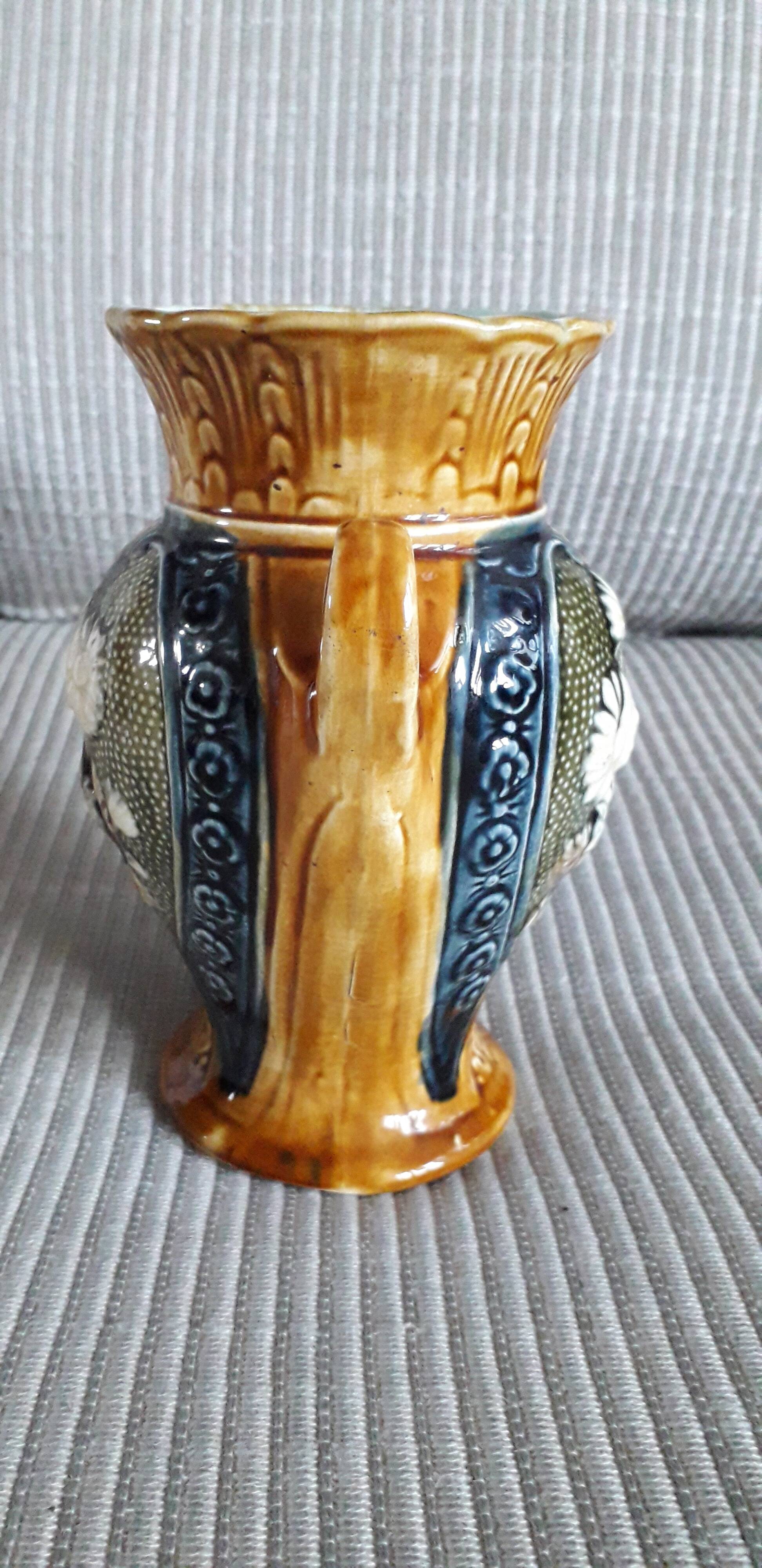 Vintage slip vase with floral decoration