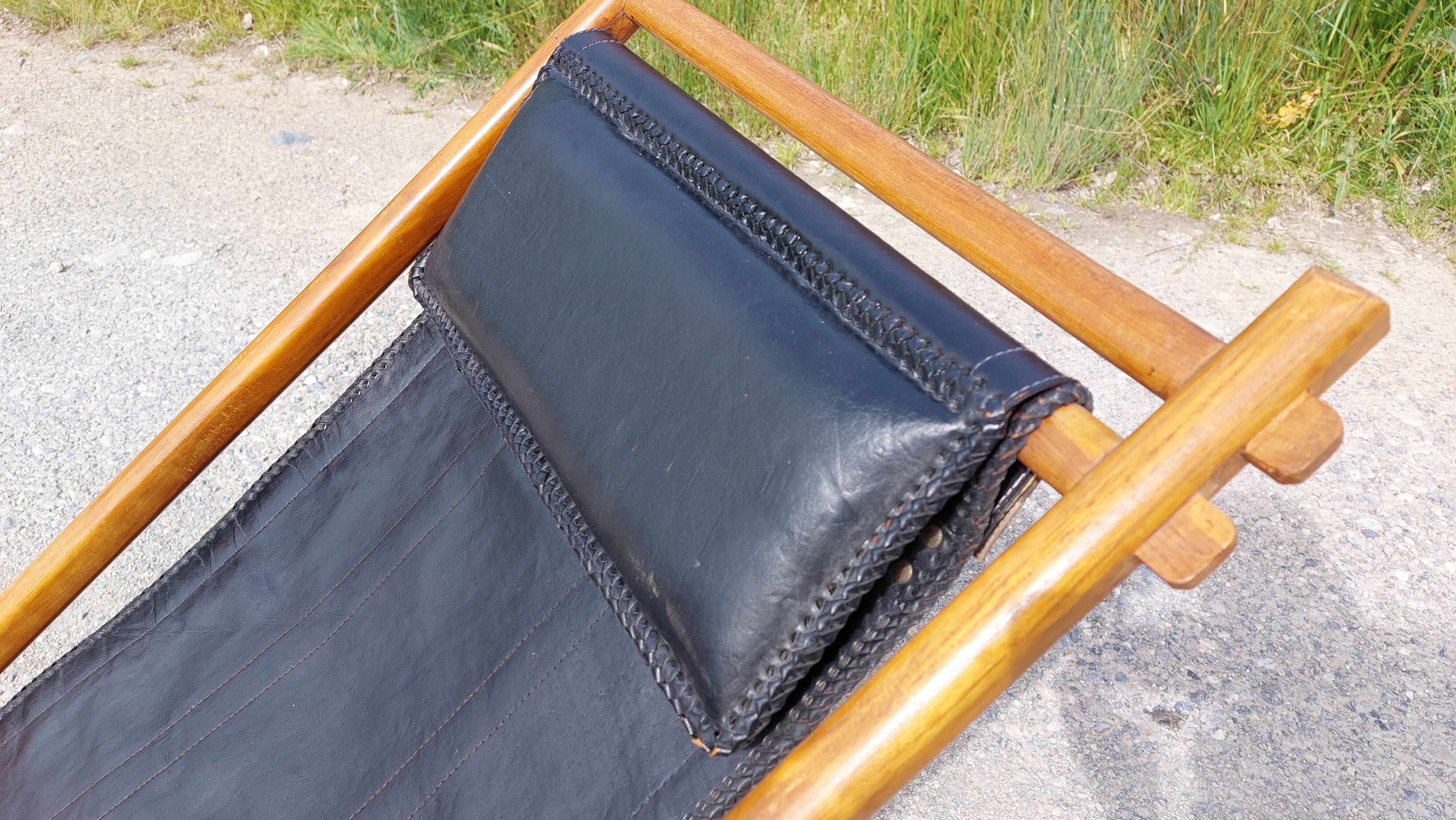 Old deckchair deck chair in wood and black leather - 40s