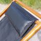 Old deckchair deck chair in wood and black leather - 40s