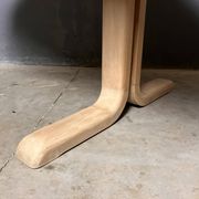 Oval extendable dining table in beech with Danish design.
