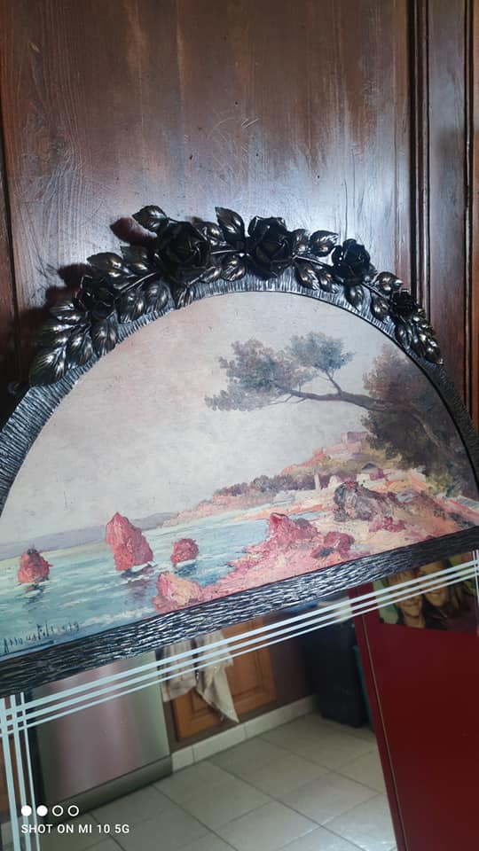 Overmantel mirror from the decorative arts period, 1929, in hammered wrought iron, 75x160cm