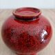 Red and black ceramic vase or pot cover