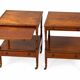 Pair of English mahogany side tables with sliding shelf.