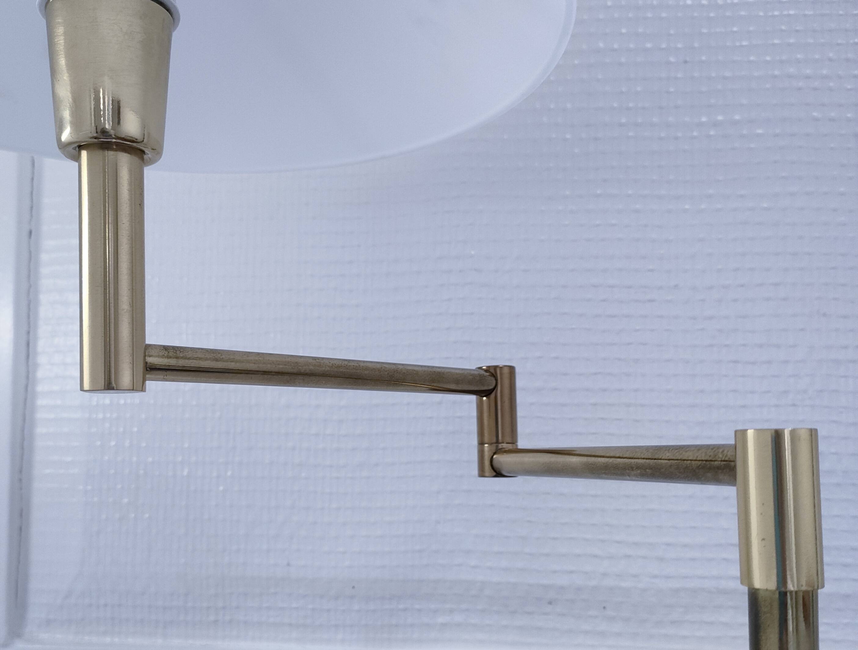 Articulated reading floor lamp in gold metal from the 90s