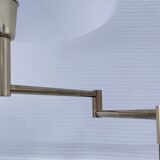 Articulated reading floor lamp in gold metal from the 90s