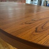 Round extendable rosewood table from the 70s