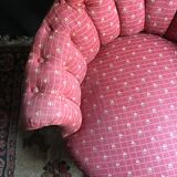 Paire de fauteuils crapaud sur roulettes capitonné