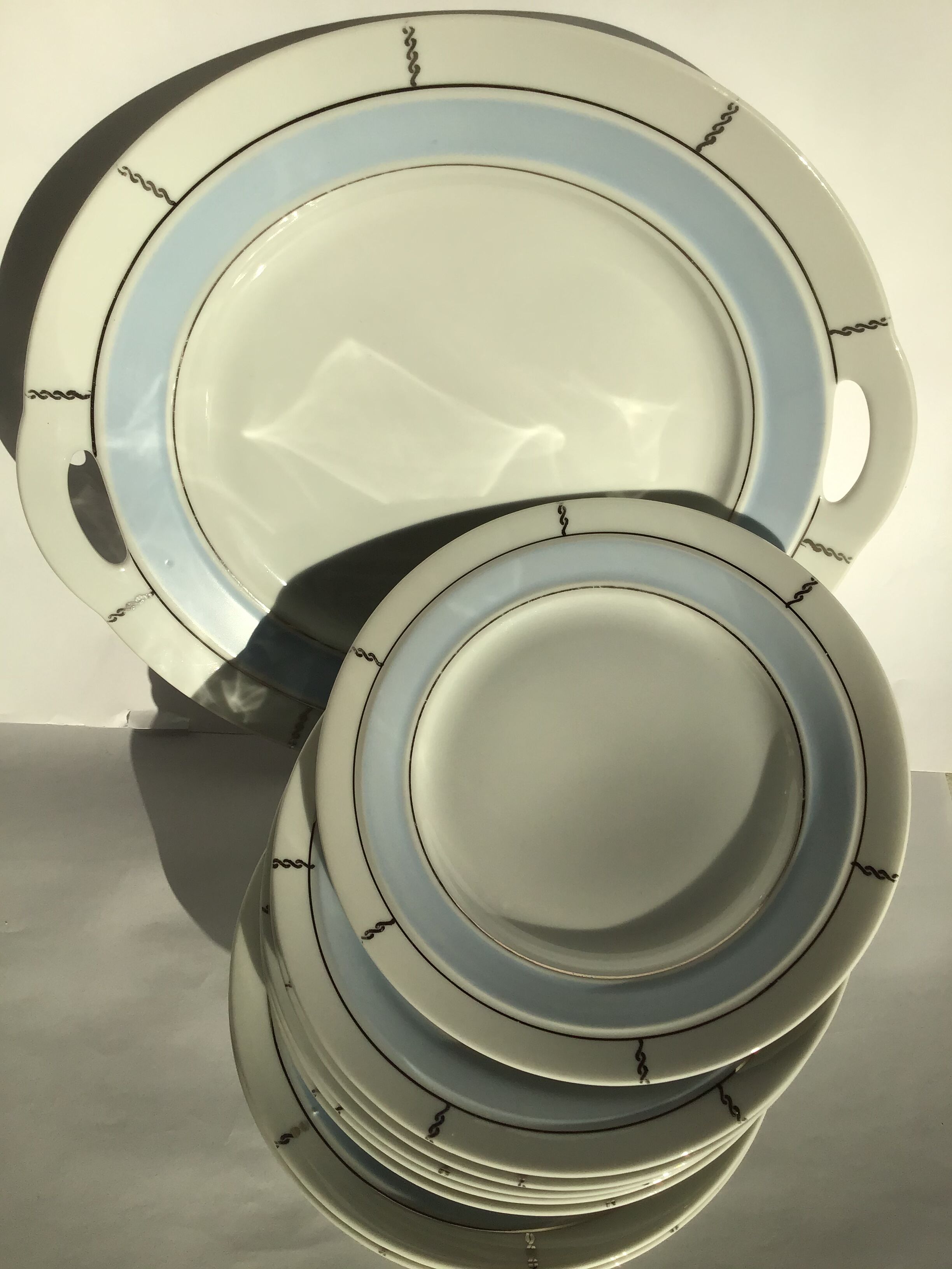 7 Dessert plates + dish in fine sky blue porcelain