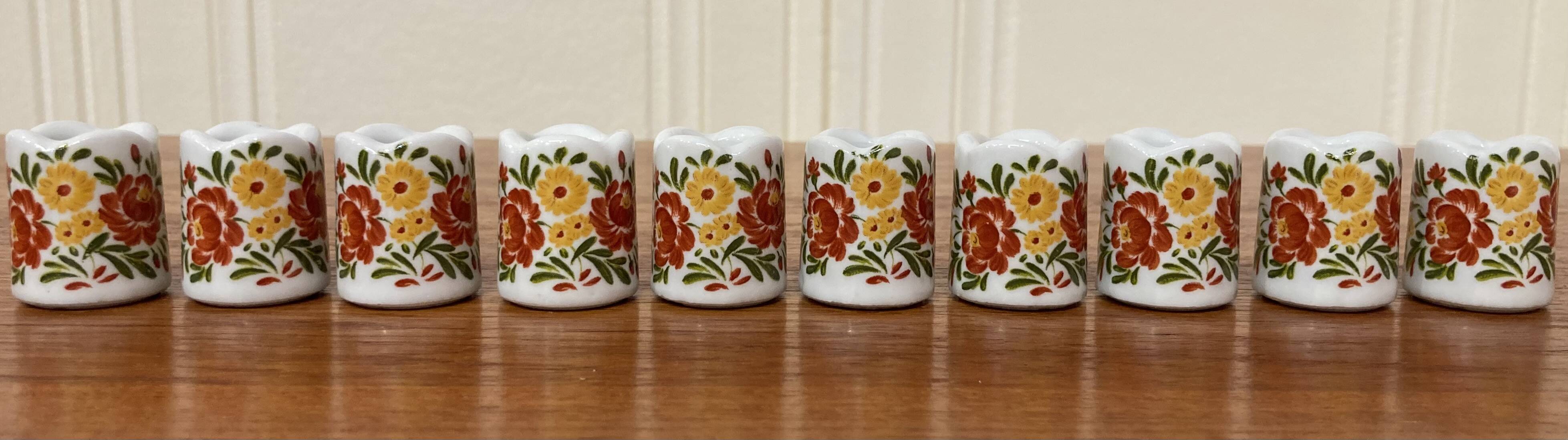 Set of ten 1950s design candle holders.