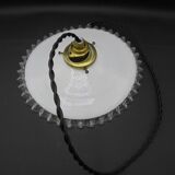 Suspension in corrugated opaline