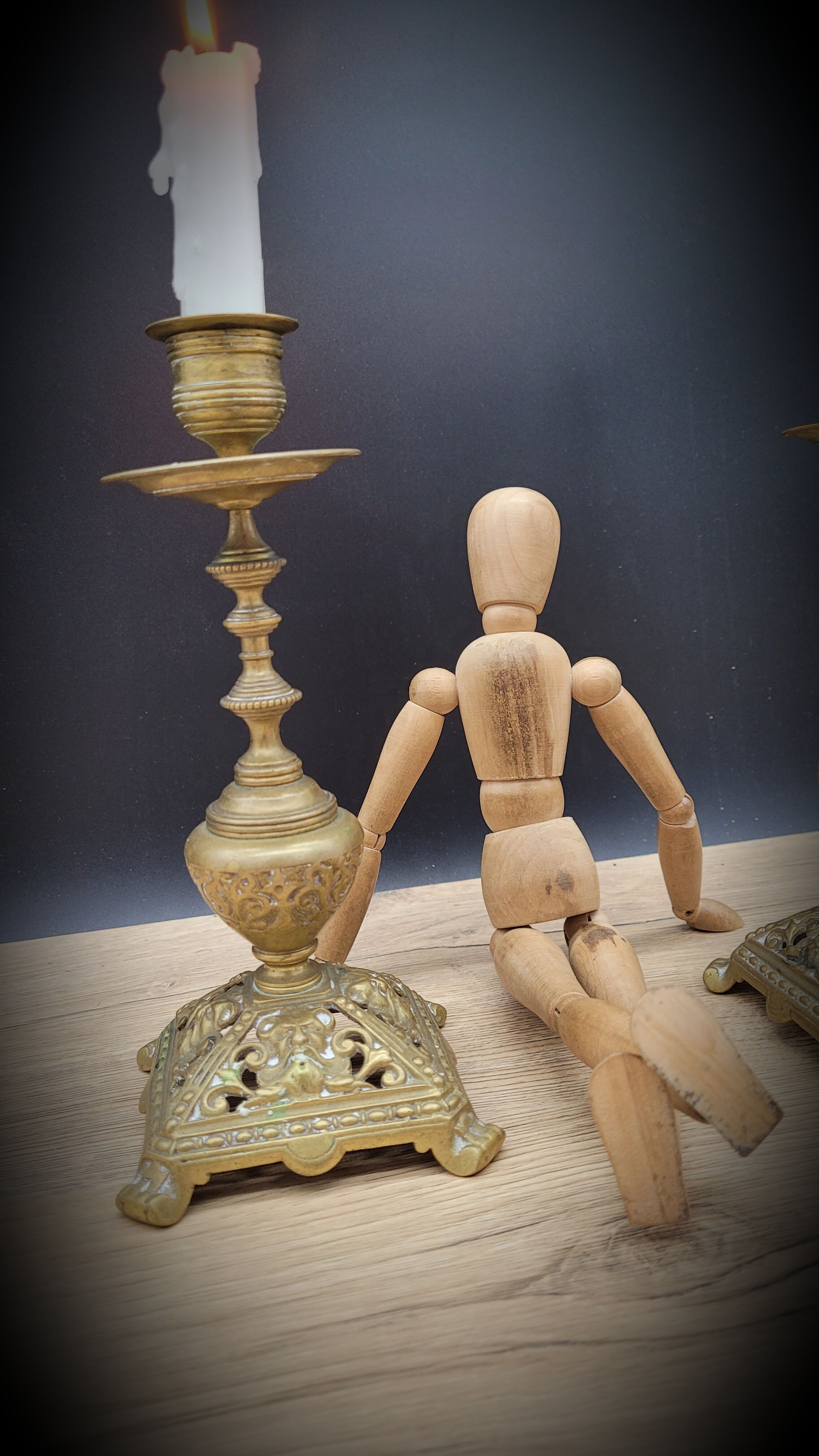 Duo worked brass candle holders