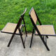 Pair of folding chairs, cane, 70s