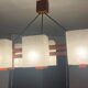 Scandinavian chandelier with 6 lights in teak and a perspex shade.