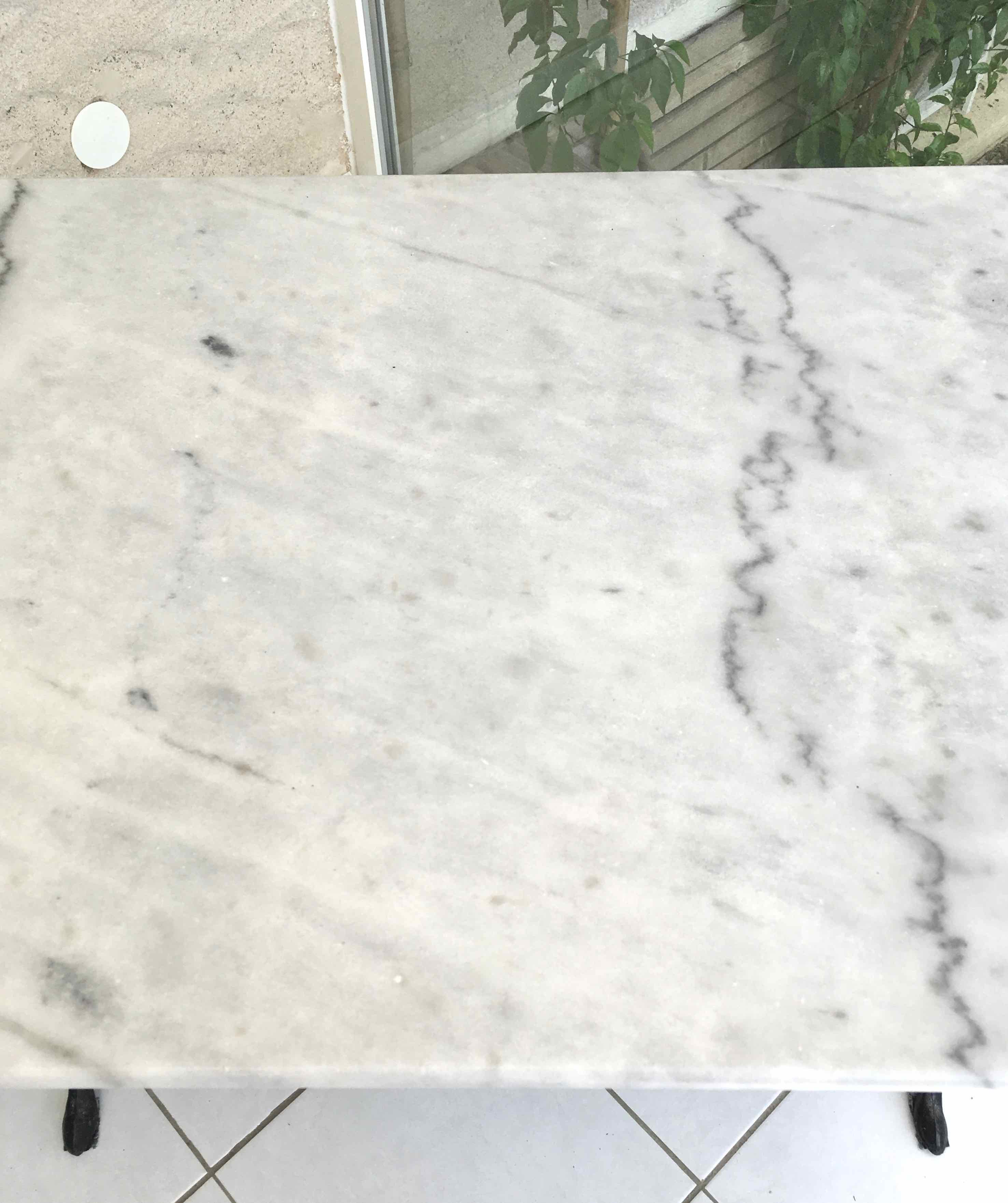 Marble and cast iron bistro table