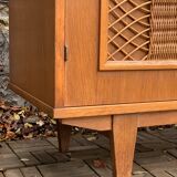 Rattan wardrobe and its compass-legged chest of drawers, 1960