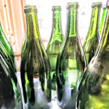 Old bottles in blown glass